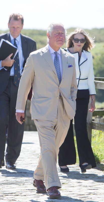 FILE PHOTO: Britain's Prince Charles, Prince of Wales and Britain's Camilla, Duchess of Cornwall visit Tintagel Castle in Cornwall