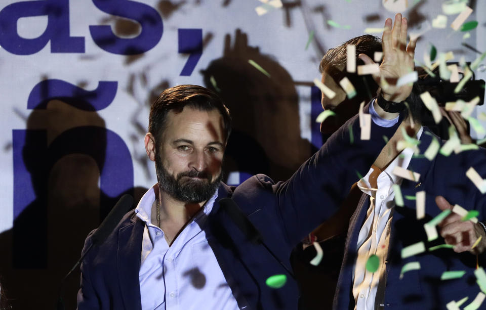 Santiago Abascal, leader of far right party Vox, waves to supporters gathered outside the party headquarters following the general election in Madrid, Sunday, April 28, 2019. A divided Spain voted Sunday in its third general election in four years, with all eyes on whether a far-right party will enter Parliament for the first time in decades and potentially help unseat the Socialist government. (AP Photo/Manu Fernandez)