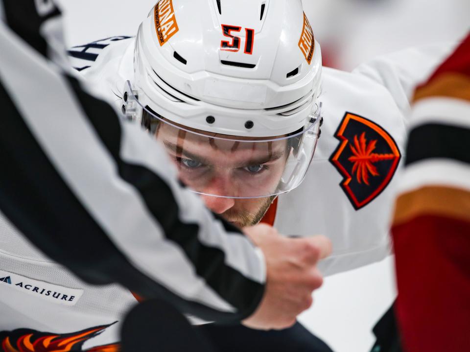 Coachella Valley forward Shane Wright (51) trains his eyes on the puck before a face-off during the first period of their game at Acrisure Arena in Palm Desert, Calif., Saturday, Feb. 3, 2024.