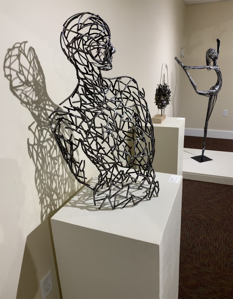 The Gadsen Arts Center & Museum is showing Mark Georgiades’ exhibit, Visage, which displays his welded metal sculptures of human faces and torsos,