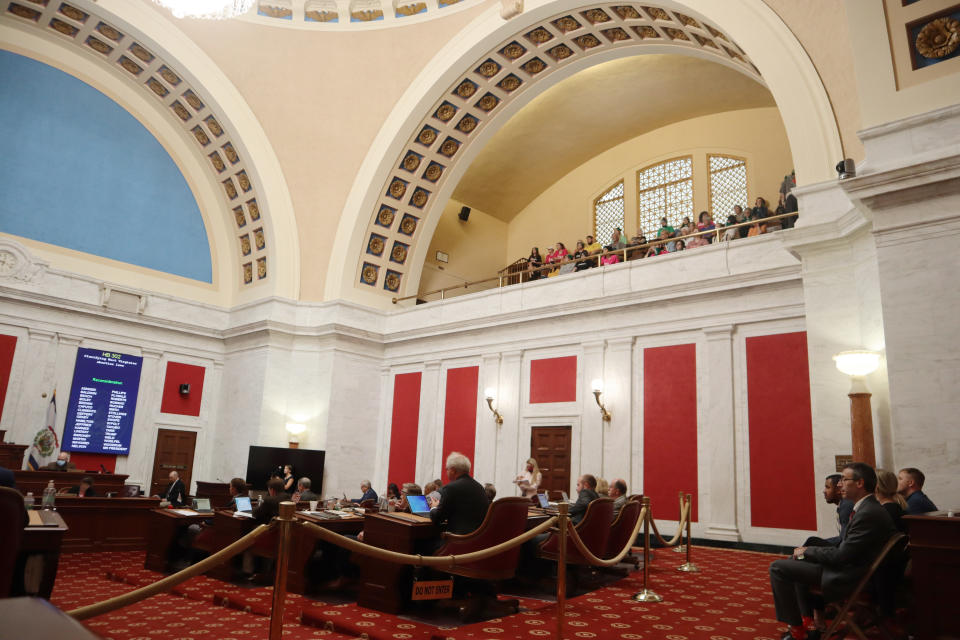 West Virginia state senators debate a sweeping bill to ban abortion with few exceptions on the Senate floor in Charleston, W.Va., as onlookers watch from the gallery on Tuesday, Sept. 13, 2022. Several Republican lawmakers have said they hope the bill will make it impossible for the state's only abortion clinic to continue to offer the procedure. (AP Photo/Leah Willingham)