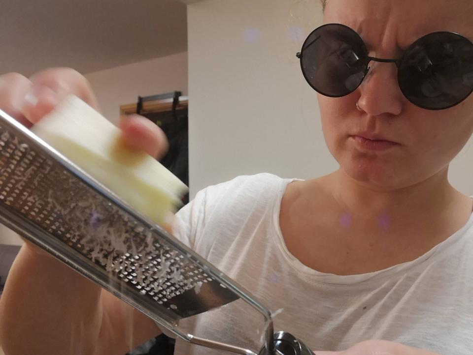 The author grating cheese