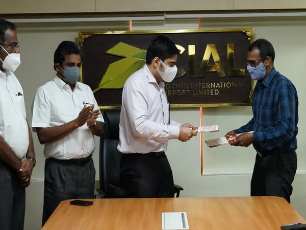 CIAL Managing Director S Suhas IAS and Muziris Heritage Project Ltd Managing Director PM Nowshad exchange the MOU papers at a function held at Kochi airport.