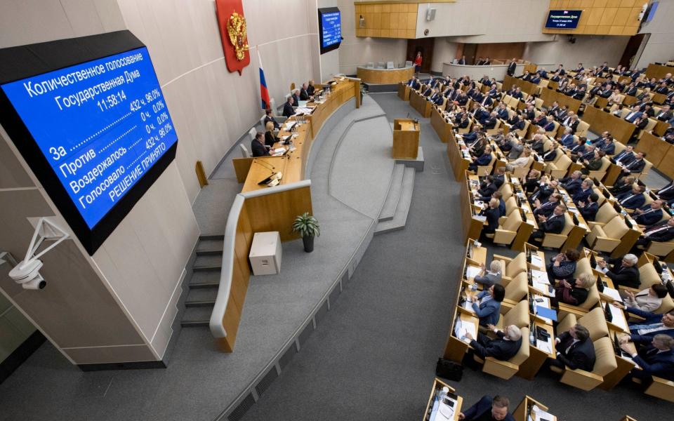 Russia's parliament voted on Thursday to give early approval to constitutional amendments aimed to provide President Vladimir Putin with a new role to stay in power. - AP