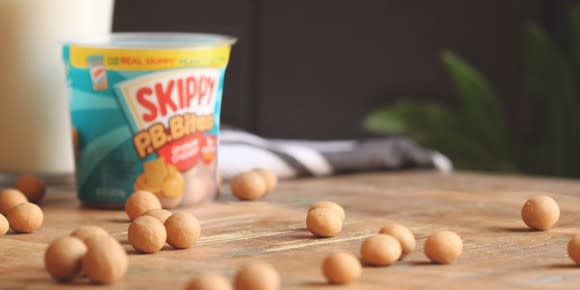 Skippy peanut butter bites spread out on a table.