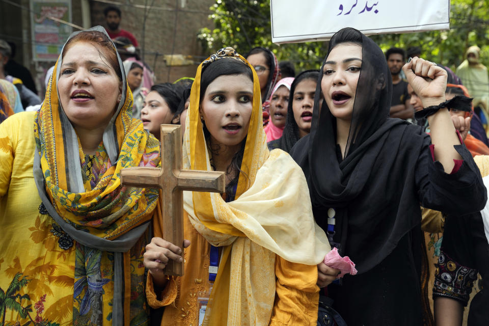 Christians women hold a demonstration condemning the recent attack on a Christian area by an angry Muslim mob, In Lahore, Pakistan, Sunday, Aug. 20, 2023. (AP Photo/K.M. Chaudary)