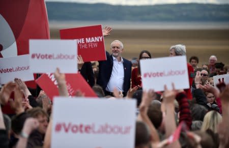 FILE PHOTO: Britain's opposition Labour Party leader, Jeremy Corbyn speaks at a campaign rally in Liverpool, Britain May 20, 2017.   REUTERS/Hannah McKay