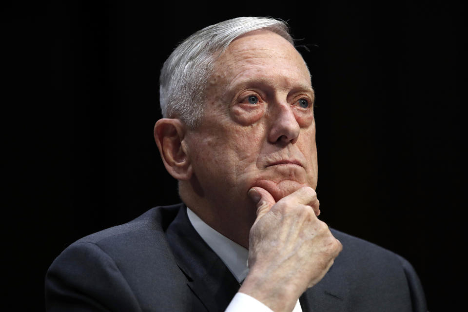 FILE - In this April 26, 2018, file photo, Defense Secretary Jim Mattis listens to a question during a hearing on Capitol Hill in Washington. Mattis warns bitter political divisions have pushed American society to the “breaking point” in his most extensive public remarks since he resigned in protest from the Trump administration. (AP Photo/Jacquelyn Martin, File)