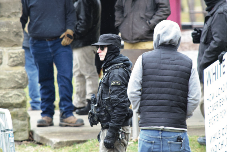 Aimenn Penny of Alliance, center looking left, was sentenced Monday to 18 years in prison firebombing a Geauga County church on March 25, 2023.