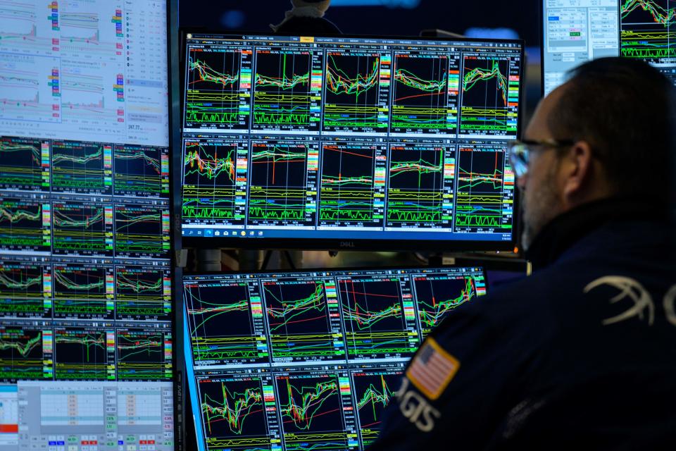 FTSE  Traders work on the floor of the New York Stock Exchange during opening bell in New York City on January 18, 2023. - Wall Street stocks climbed early on January 18, 2023, on easing worries about further Federal Reserve moves to aggressively counter inflation following the latest US economic data. (Photo by ANGELA WEISS / AFP) (Photo by ANGELA WEISS/AFP via Getty Images)