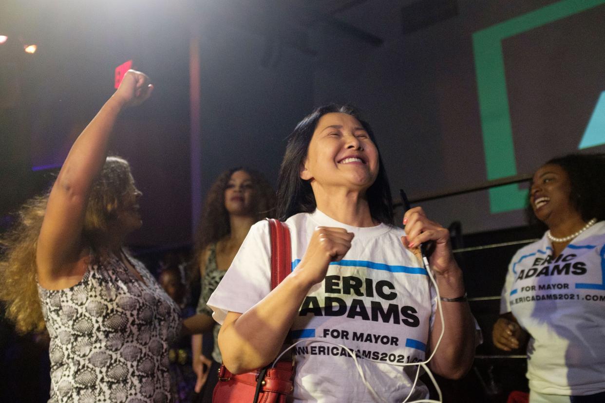 Eric Adams supporters celebrate their candidate's early lead at Adams's primary night party in Williamsburg, Brooklyn, New York City on Tuesday, June 22. 