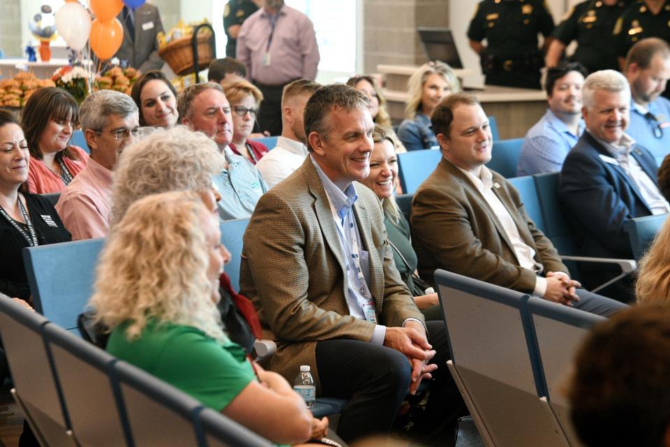 People gather in the new concourse at Destin-Fort Walton Beach Airport, which will serve only Allegiant Air customers.