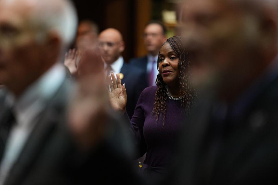 Indiana Rep. Robin Shackleford swears into office, among fellow House representatives, on Tuesday, Nov. 22, 2022, during the ceremonial start of the upcoming legislative session at the Statehouse in Indianapolis. The session starts in earnest on Jan. 9, 2023.