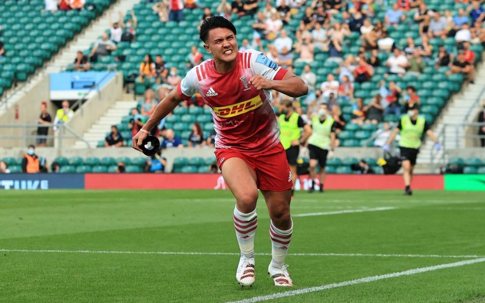 Marcus Smith of Harlequins celebrates after kicking a conversion to take the lead during the Gallagher Premiership Rugby Final between Exeter Chiefs and Harlequins at Twickenham Stadium on June 26, 2021 in London, England. - GETTY IMAGES