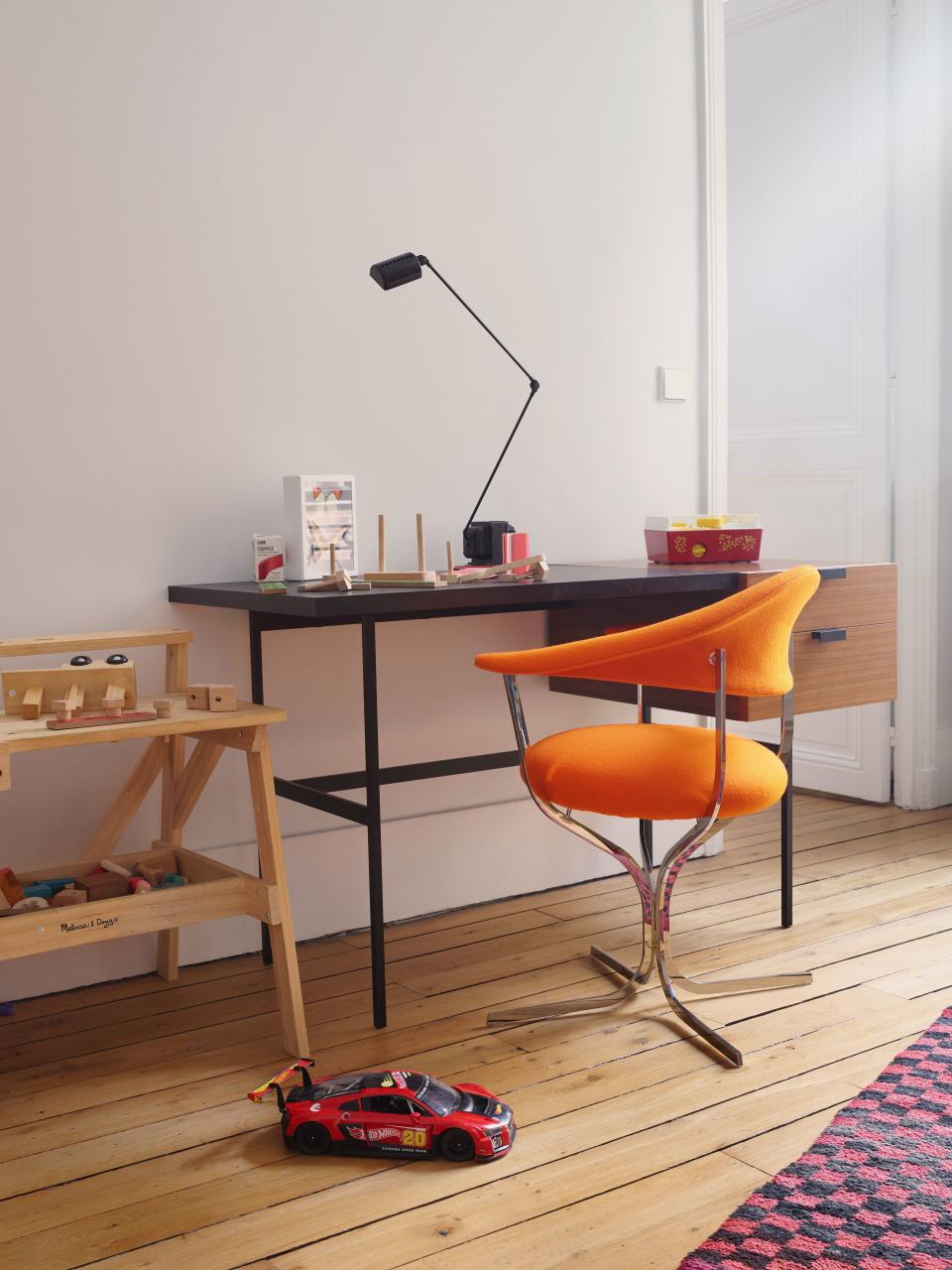 Paulin's Thonet desk with a Paulin, Paulin, Paulin F050 chair, which was designed for Artifort in 1959 but is only now being produced for the first time.