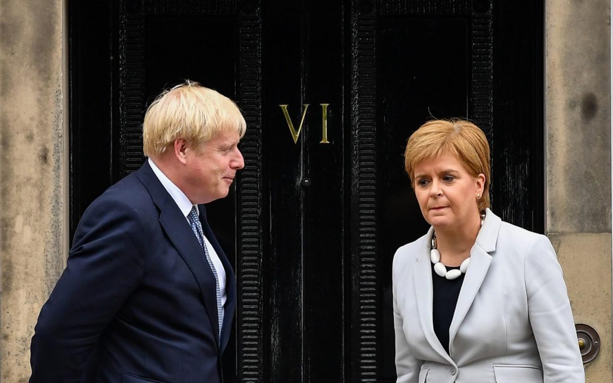 FASLANE, SCOTLAND - JULY 29: Scotland's First Minister Nicola Sturgeon welcomes Prime Minister Boris Johnson outside Bute House on July 29, 2019 in Edinburgh, Scotland. The PM is due to announce Â£300m of funding to help communities in Scotland, Wales and Northern Ireland. ( (Photo by Jeff J Mitchell/Getty Images) - Jeff J Mitchell/Getty Images