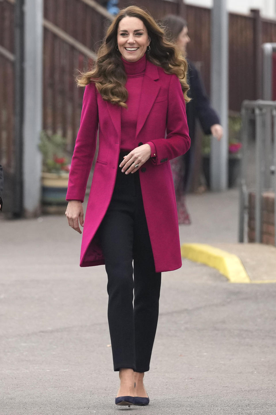 Kate wears Hobbs London's Lara Sweater and Tilda coat as she arrives for a visit to Nower Hill High School in London, on 24 November 2021. (Kirsty Wigglesworth-WPA Pool/Getty Images)