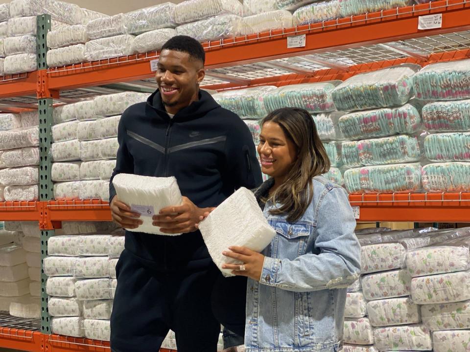 Bucks superstar Giannis Antetokounmpo and his longtime partner, Mariah Riddlesprigger, promote the Milwaukee Diaper Mission on Monday.