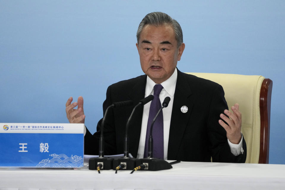 FILE - Chinese Foreign Minister Wang Yi speaks during a press conference for the Third Belt and Road Forum at the China National Convention Center in Beijing, on Oct. 18, 2023. The foreign ministers of the Japan, South Korea and China are to meet Sunday, Nov. 26, in Busan, Seoul’s Foreign Ministry said in a statement Friday, Nov. 24.(AP Photo/Andy Wong, File)