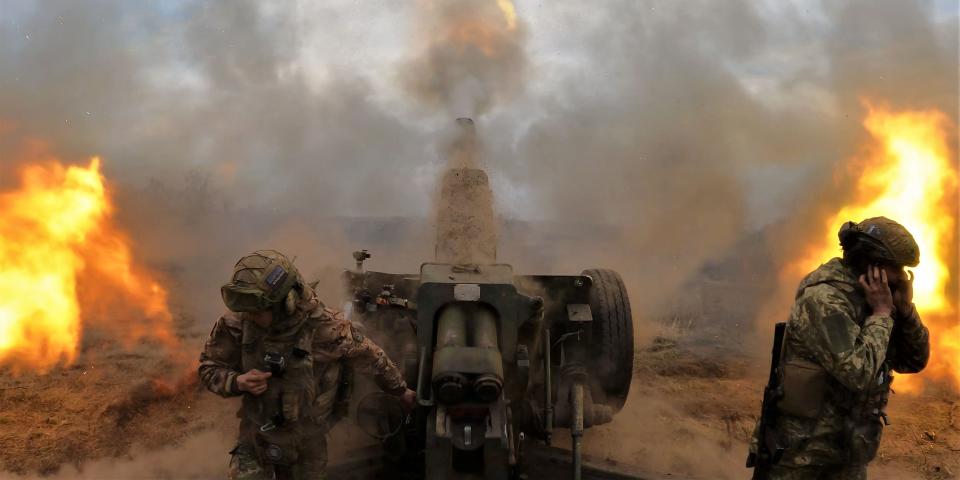 Ukrainian servicemen fire with a D-30 howitzer at Russian positions near Bakhmut, eastern Ukraine, on March 21, 2023, amid the Russian invasion of Ukraine.