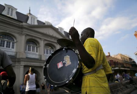 A brass band performs in Jackson Square one day before the ten year anniversary of Hurricane Katrina in New Orleans, Louisiana, August 28, 2015. REUTERS/Jonathan Bachman