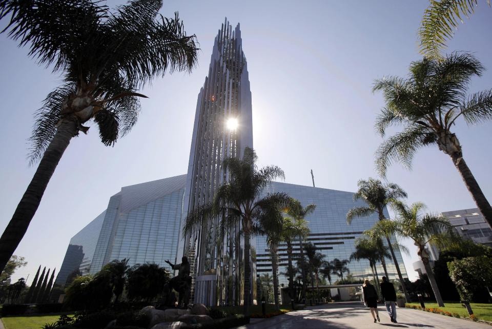 FILE - This Oct. 27, 2011 photo shows the Crystal Cathedral in Garden Grove, Calif. Crystal Cathedral Ministries will keep airing the "Hour of Power" television program and hold worship services in this famous glass-paned cathedral despite the departure of founding pastor Robert H. Schuller and his entire family, according to a statement issued Tuesday March 13, 2012. (AP Photo/Jae C. Hong, File)