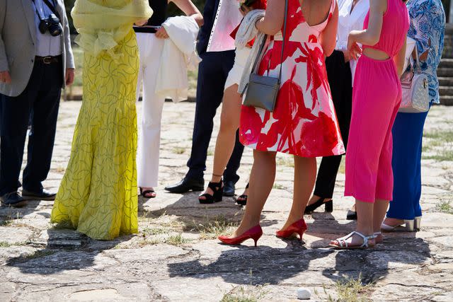 <p>Getty</p> Stock image of wedding guests waiting outdoors