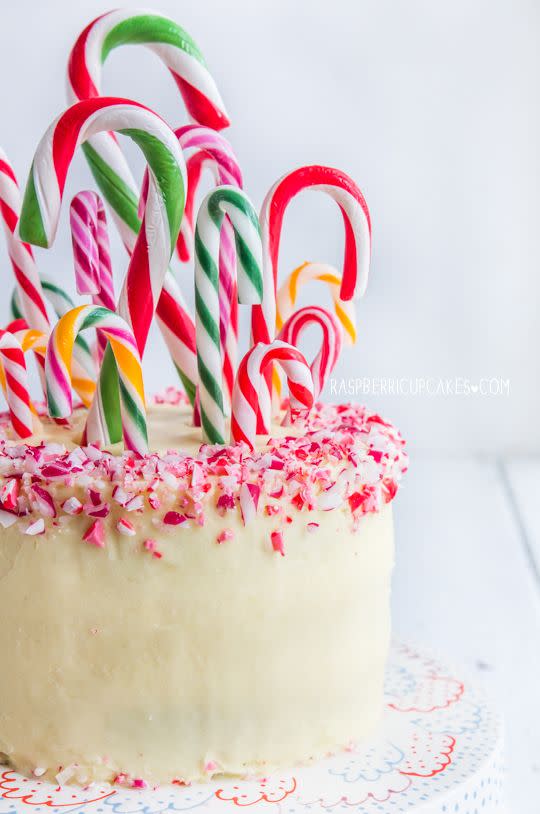 <p>Before serving, pass out candy canes to little ones so they can help decorate this cake. Bonus: Once you cut in, guests will be impressed by the beautiful red and white marbling inside. </p><p><strong>Get the recipe at <a href="http://www.raspberricupcakes.com/2014/12/candy-cane-peppermint-and-white.html?m=1" rel="nofollow noopener" target="_blank" data-ylk="slk:Raspberri Cupcakes" class="link ">Raspberri Cupcakes</a>.</strong> </p>