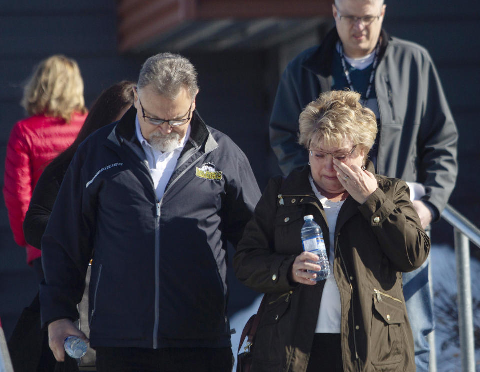 Brad Cross and Marilyn Cross, parents of the Humboldt Broncos assistant coach Mark Cross, walk out of the Kerry Vickar Centre after the sentencing for truck driver Jaskirat Sidhu. (AP)