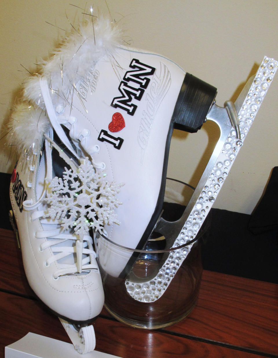 The shoes to be worn in the 2014 Miss America pageant's "show us your shoes" parade by Miss Minnesota, are displayed during a new conference on Tuesday, Sept. 10, 2013, in Atlantic City N.J. The preliminary competitions began Tuesday, which is back in Atlantic City after a six-year absence. (AP Photo/Wayne Parry)