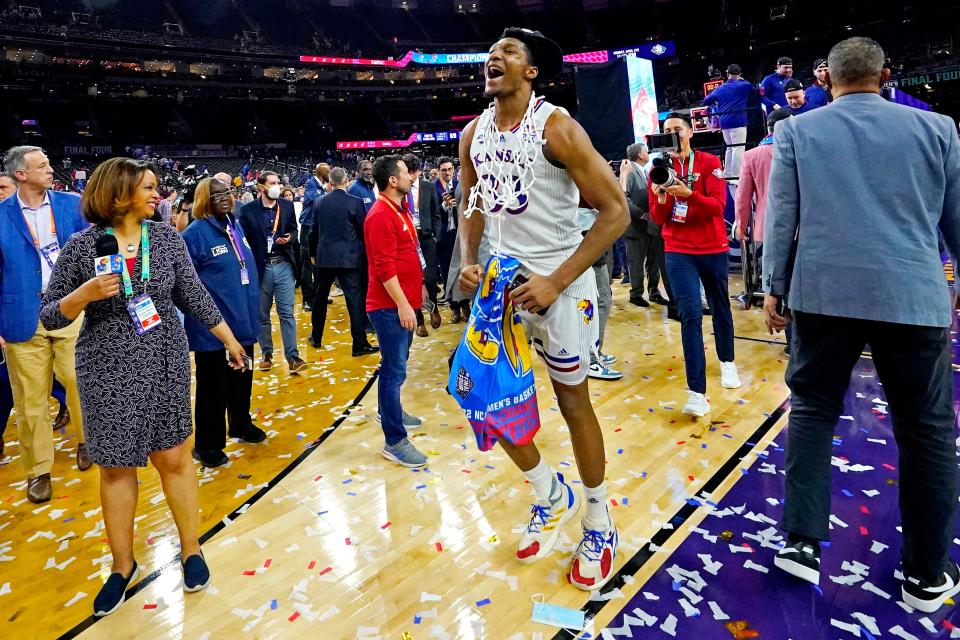 David McCormack (33) celebrates Kansas' victory against North Carolina in the national championship game of the NCAA tournament earlier this year in New Orleans. McCormack spent the NBA summer league games in Las Vegas with Minnesota.