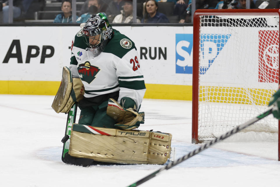 Minnesota Wild goaltender Marc-Andre Fleury blocks a San Jose Sharks shot during the first period of an NHL hockey game in San Jose, Calif., Saturday, March 11, 2023. (AP Photo/Josie Lepe)
