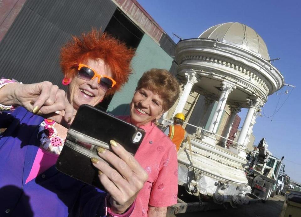 Jackie Ryle, left, and Sally Caglia, take a selfie in front of the historic Fresno County Courthouse cupola before its move last year, from a storage unit owned by the Caglia family to the Fresno Fairground, where went on display at the museum. JOHN WALKER/jwalker@fresnobee.com