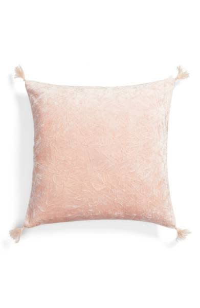 Get it <a href="https://shop.nordstrom.com/s/nordstrom-at-home-shimmer-velvet-tassel-pillow/4611054?origin=category-personalizedsort&amp;fashioncolor=BLUE%20TRADEWINDS" target="_blank">here</a>.&nbsp;