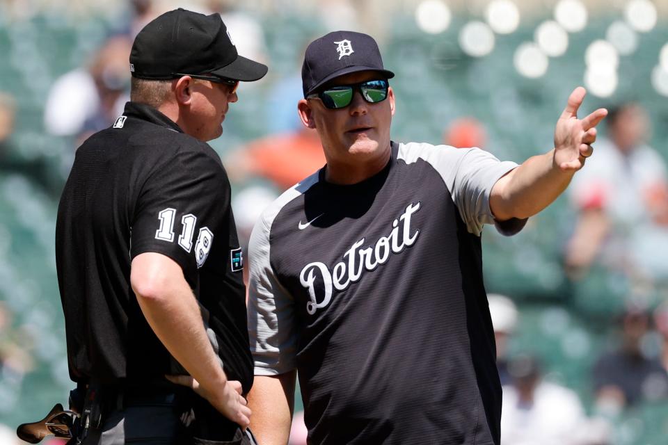 Detroit Tigers manager A.J. Hinch (14) and umpire Ryan Wills did not see eye-to-eye about the interpretation of the basepath on a Derek Hill bunt.