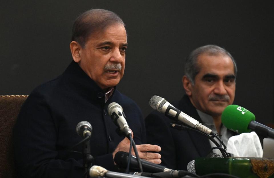 Pakistan's former prime minister and leader of the Pakistan Muslim League-Nawaz (PML-N) party Shehbaz Sharif (L) speaks during a press conference in Lahore, Pakistan, 13 Febuary 2024 (EPA)
