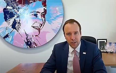 Matt Hancock in front of Damien Hirst's painting of Queen Elizabeth II