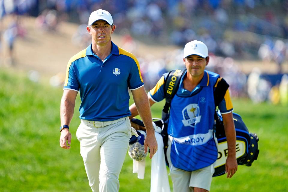 Oct 1, 2023; Rome, ITA; Team Europe golfer Rory McIlroy and his caddie Harry Diamond walk on on the first hole during the final day of the 44th Ryder Cup golf competition at Marco Simone Golf and Country Club. Mandatory Credit: Adam Cairns-USA TODAY Sports