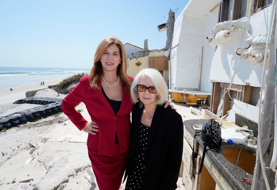 Nina Lavigna stands with her daughter Lisa Macci on Friday, April 19, 2024, at her home which was damaged by tropical storms Ian and Nicole.