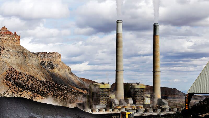A loader moves coal at the Huntington power plant in Huntington, Tuesday, March 24, 2015. Utah lawmakers passed measures putting the Delta power plant operated by the Intermountain Power Agency under stricter state control.