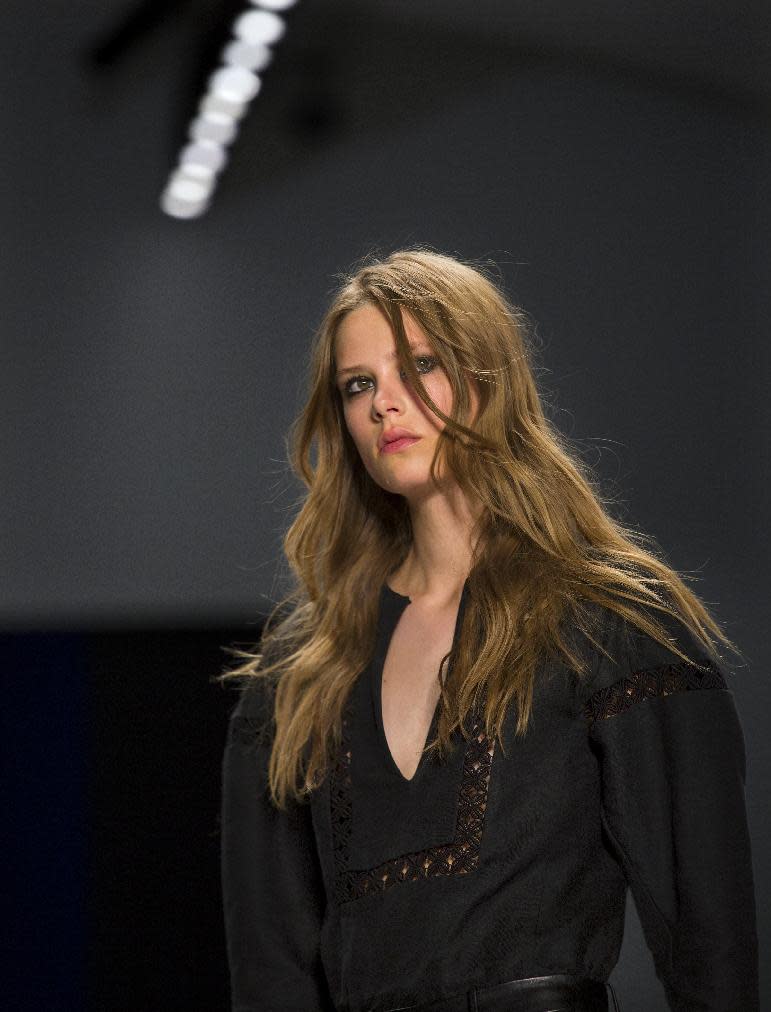 The Jill Stuart Sping 2014 collection is modeled during Fashion Week in New York, Saturday, Sept. 7, 2013. (AP Photo/Craig Ruttle)