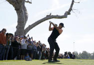 Tiger Woods tees off on the third hole during the first round of the Genesis Invitational golf tournament at Riviera Country Club, Thursday, Feb. 13, 2020, in the Pacific Palisades area of Los Angeles. (AP Photo/Ryan Kang)