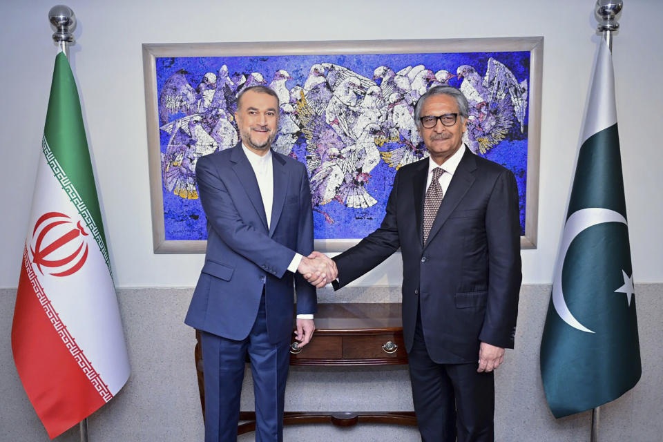 In this photo released by Pakistan's Ministry of Foreign Affairs, visiting Iran's Foreign Minister Hossein Amirabdollahian, left, shakes hands with his Pakistani counterpart Jalil Abbas Jilani upon his arrival for a meeting at the Ministry of Foreign Affairs in Islamabad, Pakistan, Monday, Jan. 29, 2024. Iran's foreign minister was in Pakistan for talks on deescalating tensions after deadly airstrikes by Tehran and Islamabad earlier this month killed at least 11 people, marking a significant escalation in fraught relations between the neighbors. (Ministry of Foreign Affairs via AP)