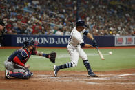 Tampa Bay Rays catcher Francisco Mejia hits a two-run double against the Boston Red Sox during the eighth inning of a baseball game Saturday, July 31, 2021, in St. Petersburg, Fla. (AP Photo/Scott Audette)