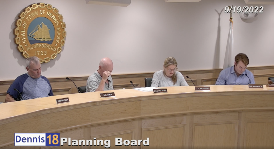 Planning Board members, (from left to right: Rick Hamlin, Brad Bishop, Liz Patterson and Paul McCormick Jr.,) look over proposed changes to Dennis' ADU bylaws submitted by the Zoning Bylaw Study Committee at a Sep. 19. meeting. The board voted unanimously to approve the changes and send them to the Select Board, who will vote to add them to the Oct. 25 special town meeting warrant.