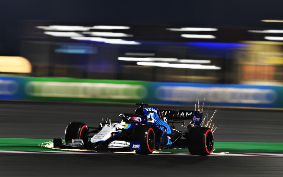 Sparks fly behind George Russell of Great Britain driving the (63) Williams Racing FW43B Mercedes during qualifying ahead of the F1 Grand Prix of Qatar at Losail International Circuit on November 20, 2021 in Doha, Qatar - Getty Images Europe 