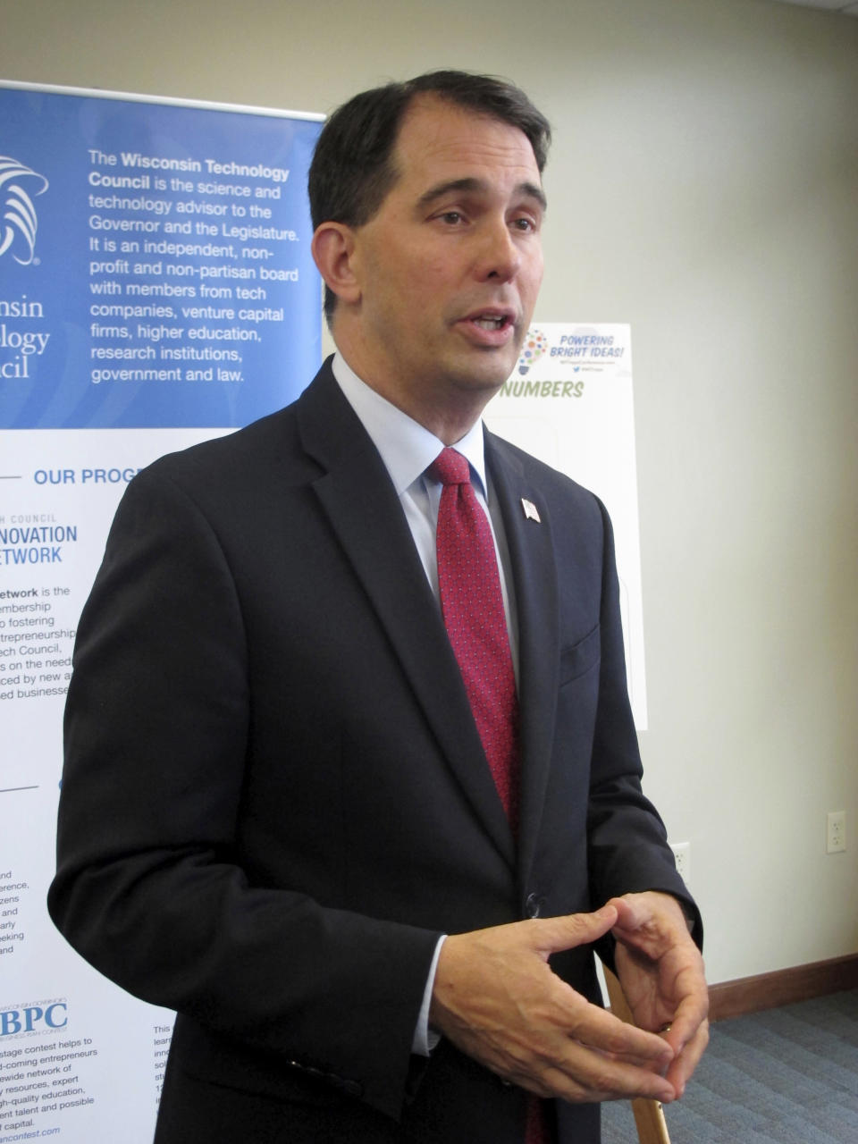 FILE - In this June 6, 2018, file photo, then Wisconsin Gov. Scott Walker speaks at a news conference in Madison, Wis. Wisconsin's conservative-controlled Supreme Court on Friday, June 21, 2019, upheld lame-duck laws limiting the powers of Democratic Gov. Evers and Attorney General Josh Kaul, handing Republican lawmakers a resounding victory. (AP Photo/Scott Bauer, File)