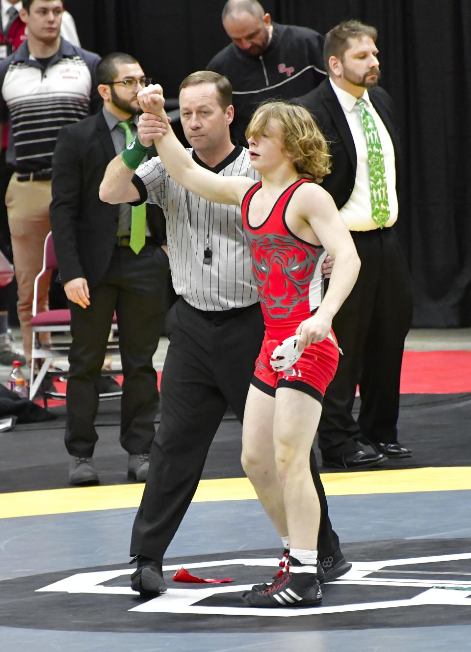 Logan Dean of Bethel-Tate has his hand raised as the victor for  Division III third place at 113 pounds during the OHSAA 86th annual boys wrestling state tournament March 10-12, 2023.