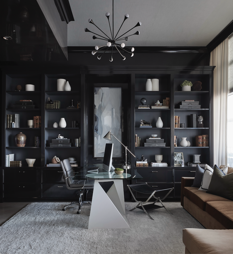 a room with a shelf full of books