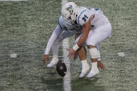 Coastal Carolina's Baden Pinson (31) picks up a fumble during the second half of an NCAA college football game against Texas State in San Marcos, Texas, Saturday, Nov. 28, 2020. Pinson recovered the ball and ran for a touchdown. (AP Photo/Chuck Burton)